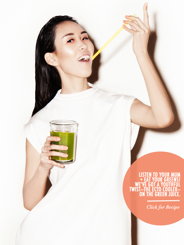 Girl drinking juice from a straw